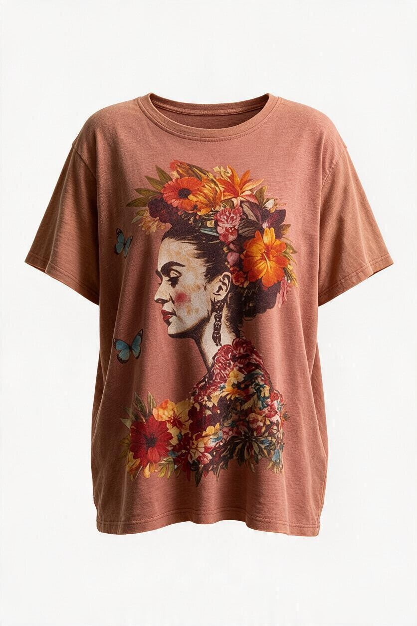 Trestles Clothing Company Frida Kahlo graphic tee in vintage washed terracotta cotton with a floral portrait print.